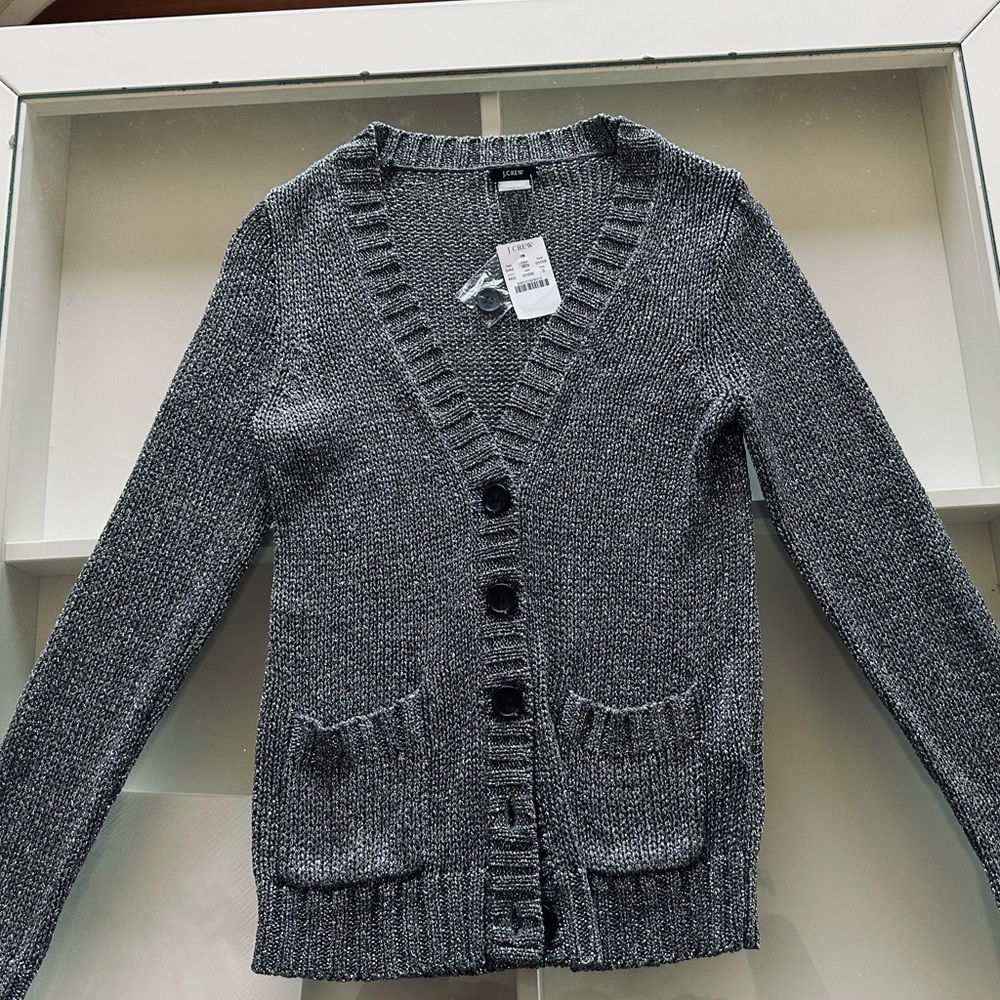 Jcrew gray/silver cardigan.Excellent condition with tags and original buttons, S